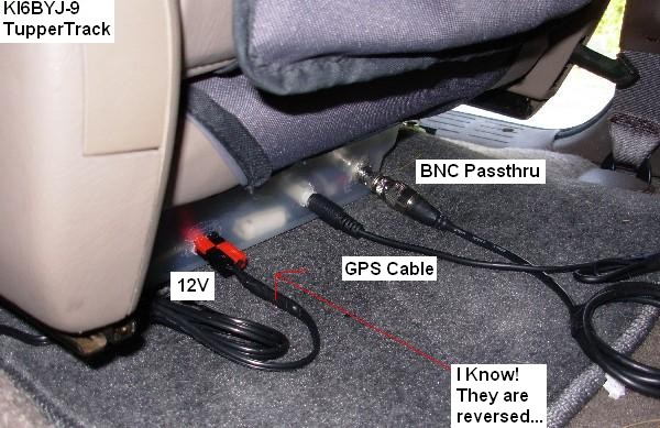 the tuppertrack snuggled under the passenger seat